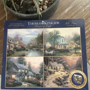 Thomas Kinkade puzzles.